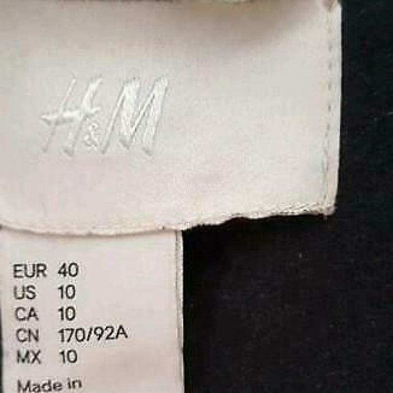 Zwarte teddy winterjas van H&M trend, maat 40